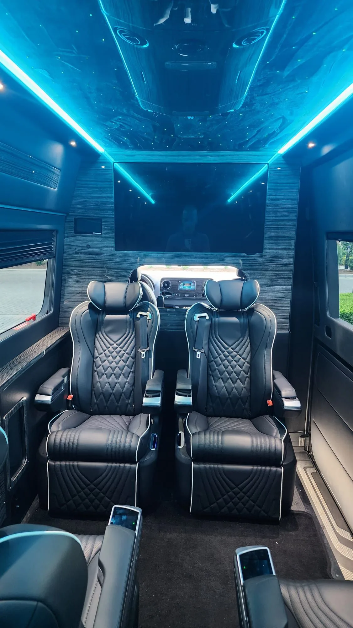 Luxury Sedan 26 Executive Sprinter interior with blue ambient lighting