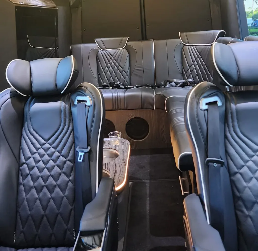 orlux luxury van interior seating captain e1776458223314 Orlando Sprinter Van with Driver - Group Transfers | Orlux 2026 Orlux Rides