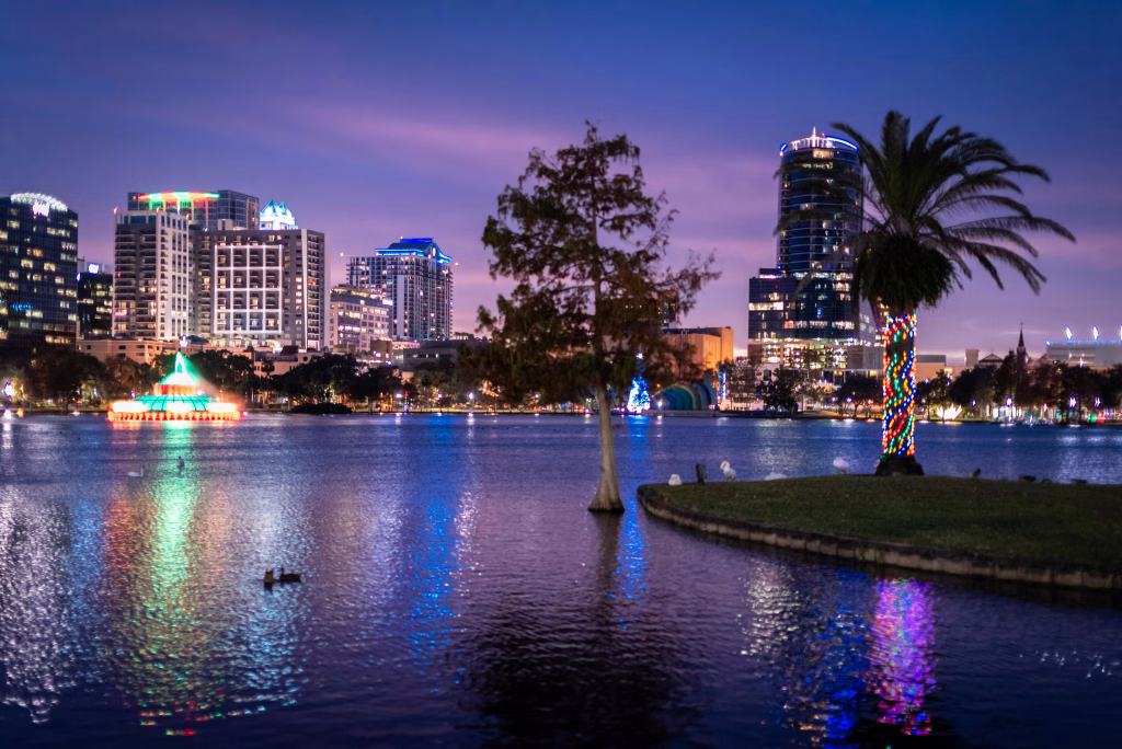 orlux orlando lake eola night skyline reflection Things to Do in Winter Park Florida: 2026 Guide | Orlux 2026 Orlux Rides